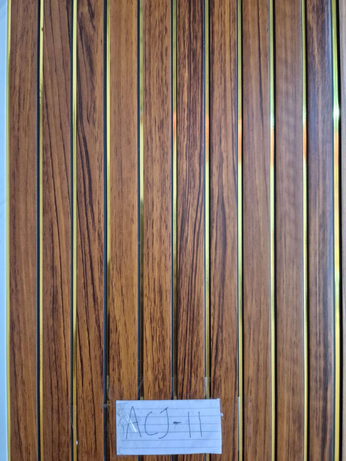 WPC Wall Panel Motif Kayu Coklat Klasik Garis Emas (ACJ-11)
